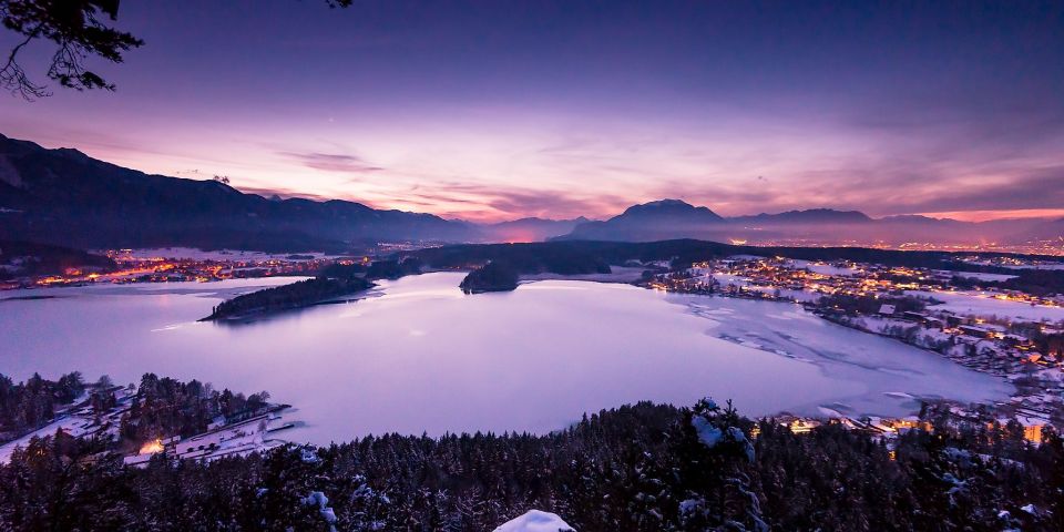 View from viewing point Taborhöhe down at Lake Faaker See in winter.